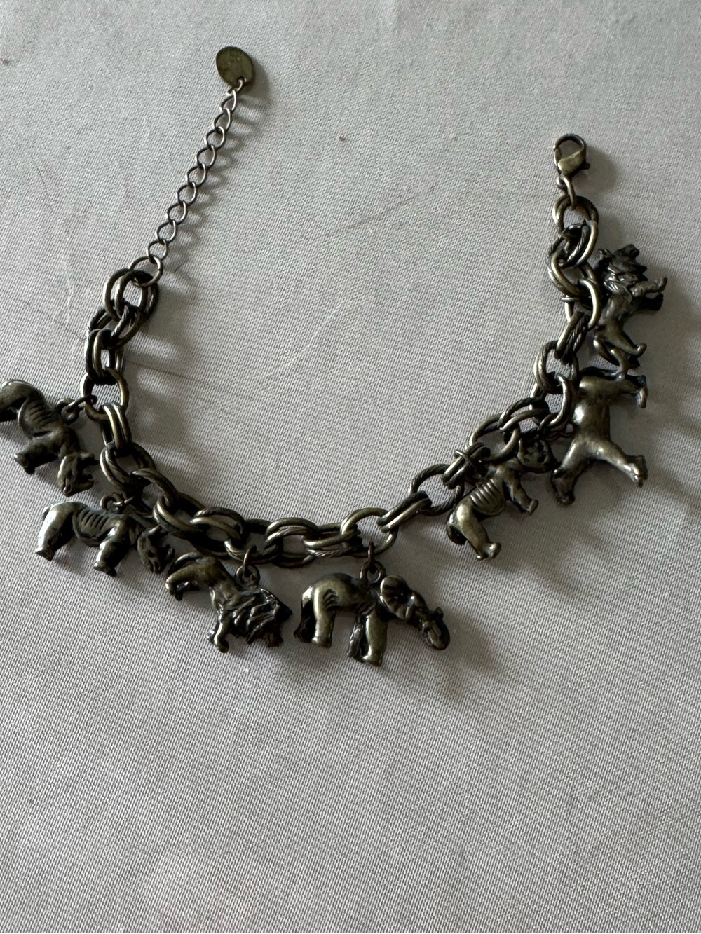 Claire’s animal charm bracelet- brass coloring